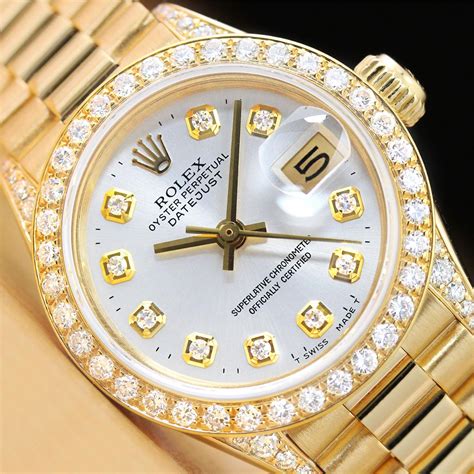 rolex ladies diamond bezel watch.